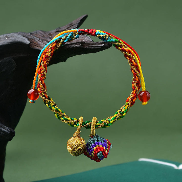 Pulsera con dijes Zongzi hecha a mano con cuerda colorida y Buddha Stones