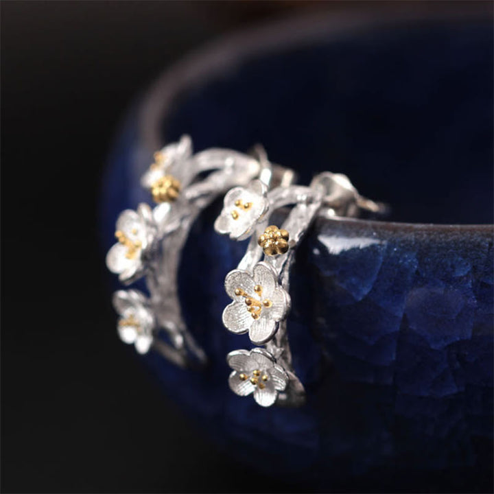 Pendientes de bendición floral de flor de ciruelo de plata de ley 925 con Buddha Stones
