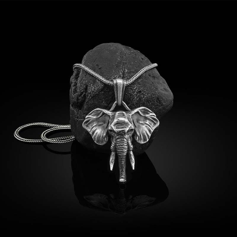 Colgante de collar resistente de acero titanio y peltre de elefante