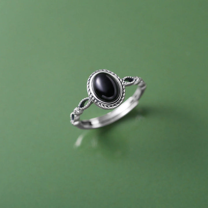 Anillo de la fortuna de ónix negro de plata de ley 925 con Buddha Stones