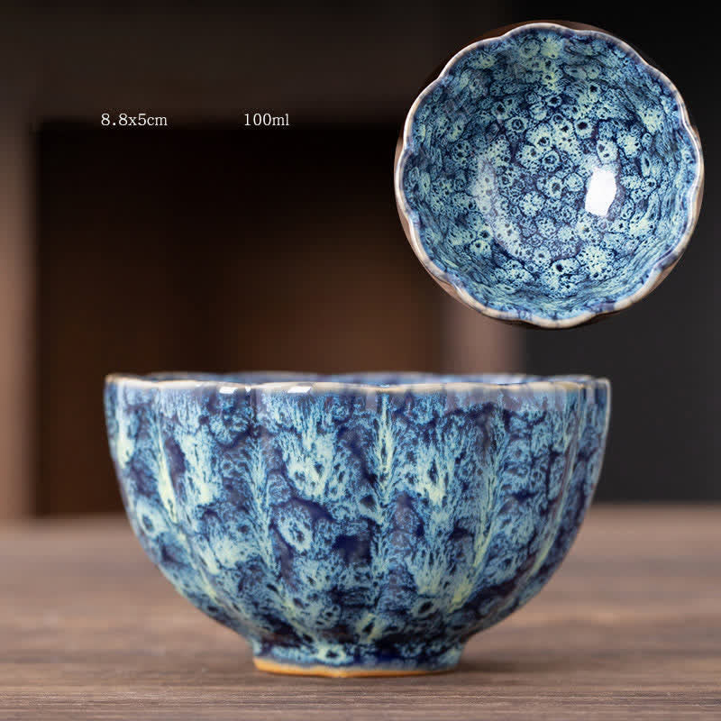 Tazas de té de cerámica con diseño de flor de melocotón y Buddha Stones
