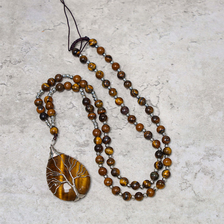 Collar con colgante de cuentas de fuerza de ojo de tigre natural de Buddha Stones
