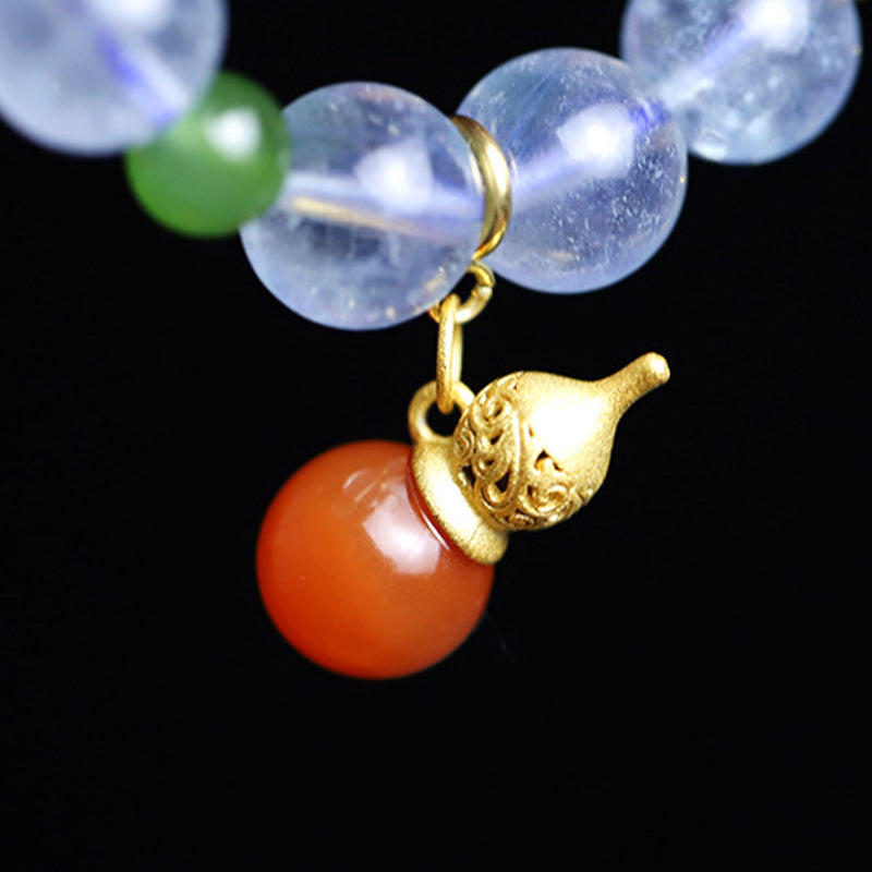 Pulsera con dije de calabaza de la paz con ágata roja y aguamarina