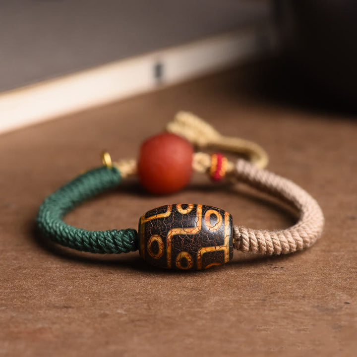 Pulsera de cuerda de riqueza con cuentas Dzi tibetanas de nueve ojos hechas a mano con Buddha Stones