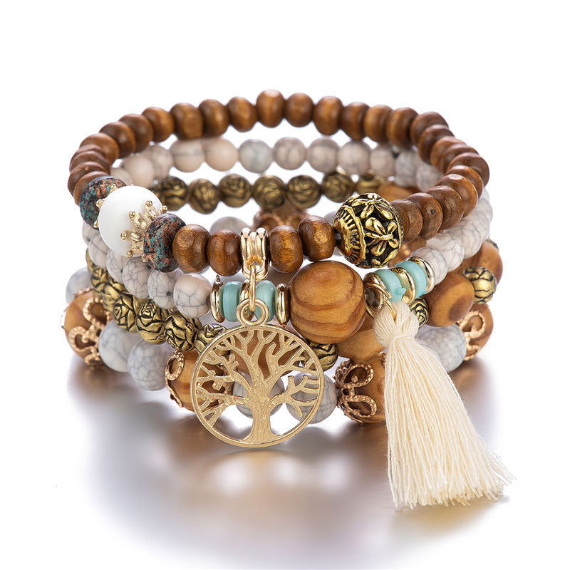 Pulsera curativa con borlas de árbol en capas de madera de wengué
