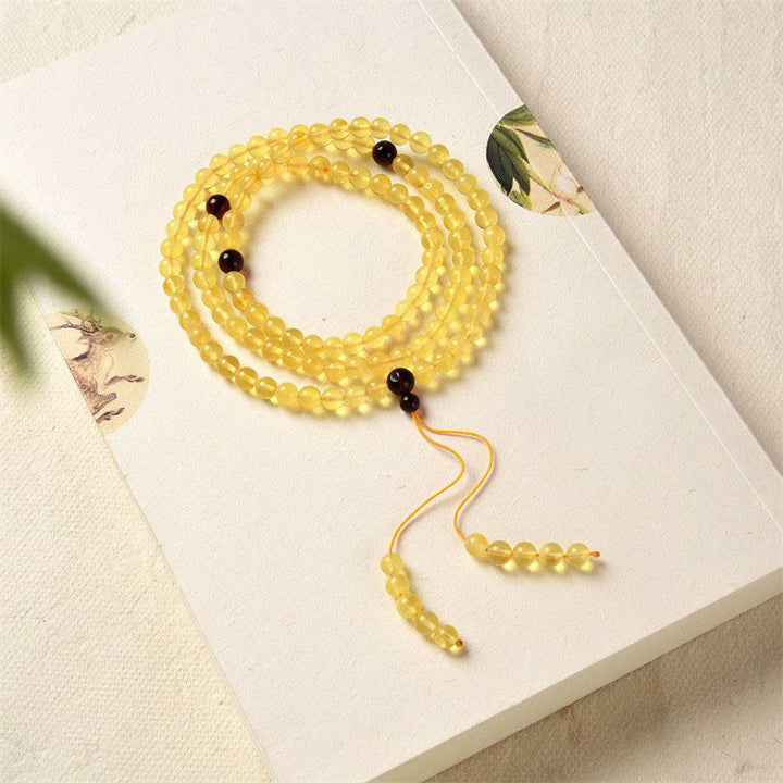 Pulsera de ansiedad transparente con Buddha Stones , 108 cuentas de Mala, ámbar Natural