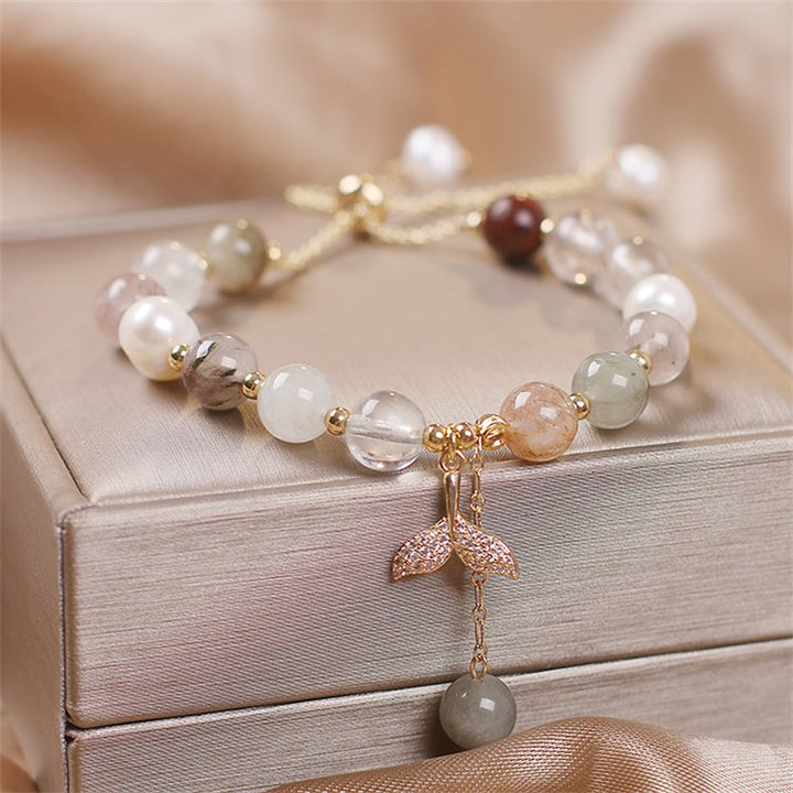 Pulsera curativa con dije de cola de pez de cuarzo rutilado de cuarzo fresa con Buddha Stones