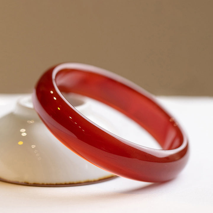 Brazalete de confianza de ágata roja natural con Buddha Stones