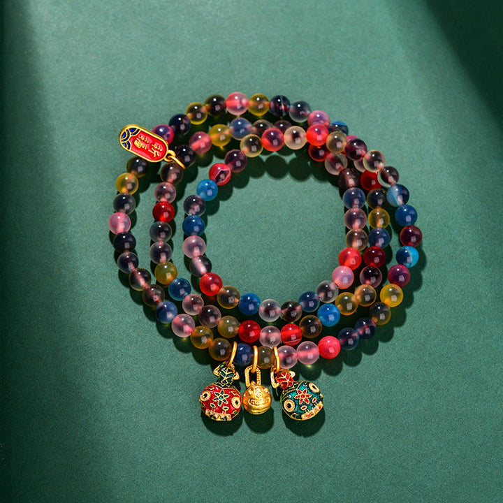 Pulsera de triple envoltura con dije de fuerza familiar de bestia tragadora de oro con ágata de caramelo colorida y Buddha Stones