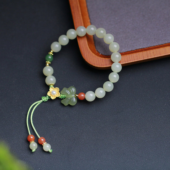 Pulsera de mariposa y flor de la suerte de jade de plata de ley 925 con Buddha Stones