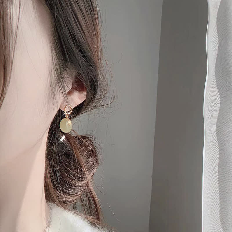 Pendientes colgantes de suerte con hebilla de paz de jade redondo