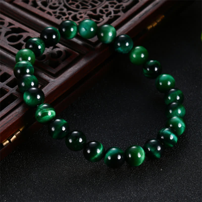 Pulsera de fuerza de ojo de tigre verde natural con Buddha Stones