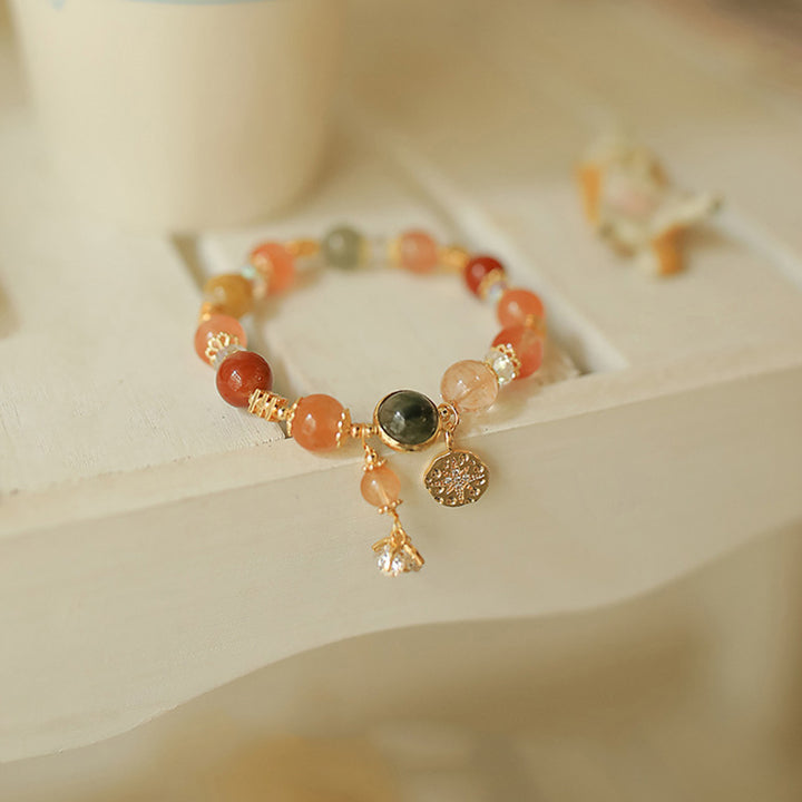 Pulsera de riqueza de flores de estrella de ocho puntas de cuarzo rutilado multicolor natural con Buddha Stones
