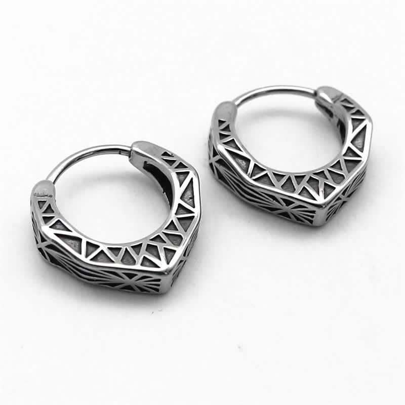 Pendientes de equilibrio de acero y titanio con aro vikingo