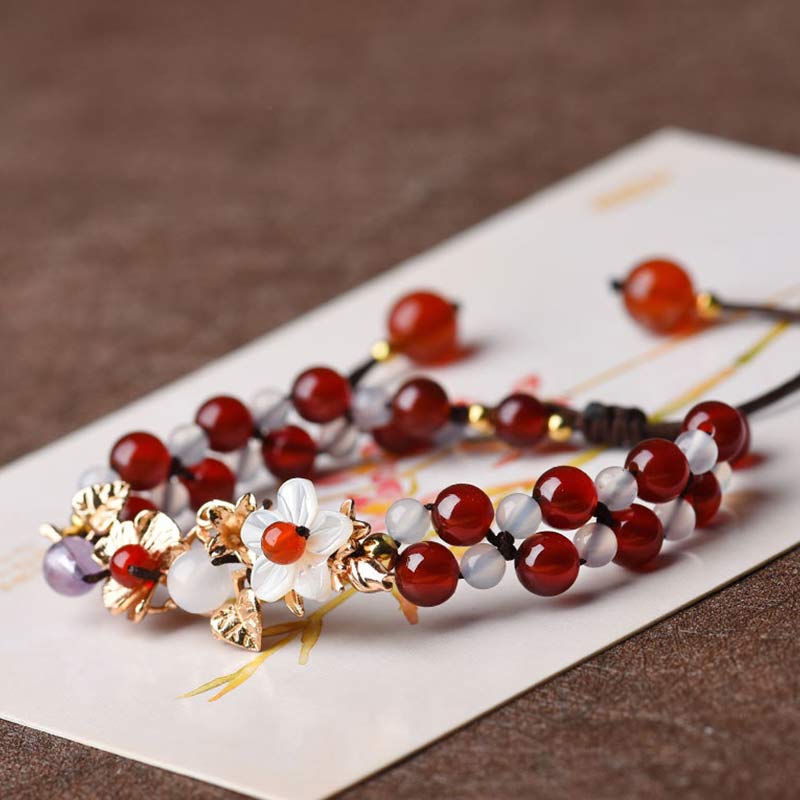 Pulsera de la suerte con pétalos de flores y cuentas de granate y aventurina verde con Buddha Stones
