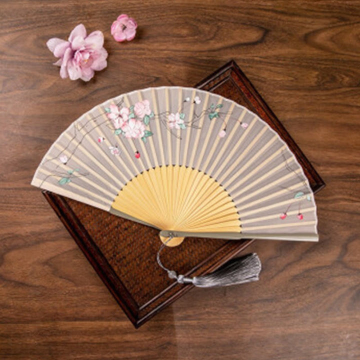 Abanico plegable de bambú de mano con flores de loto jazmín y Buddha Stones