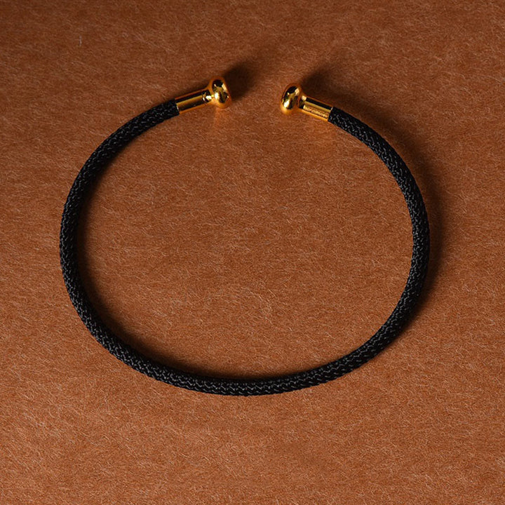 Pulsera de cuerda trenzada de la suerte hecha a mano con diseño simple de Buddha Stones - Negro - image 12