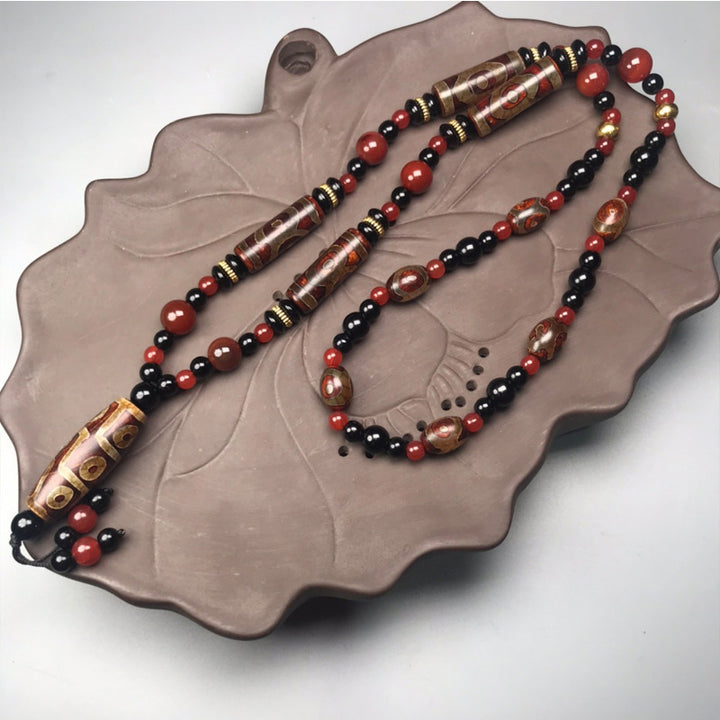 Collar de salud y riqueza con Buddha Stones Dzi de nueve ojos, ágata roja