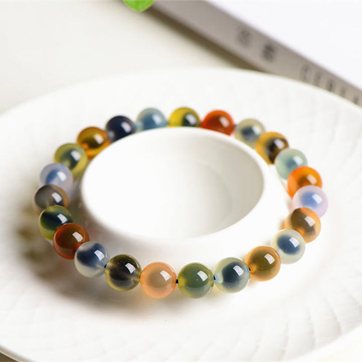 Pulsera de cuentas de fuerza de armonía de ágata de caramelo colorida natural de Buddha Stones