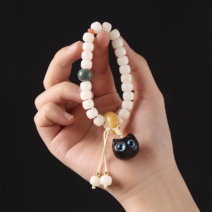 Pulsera de armonía de paz con dije de gato encantador de madera negra africana con semillas de Bodhi naturales de Buddha Stones - image 8