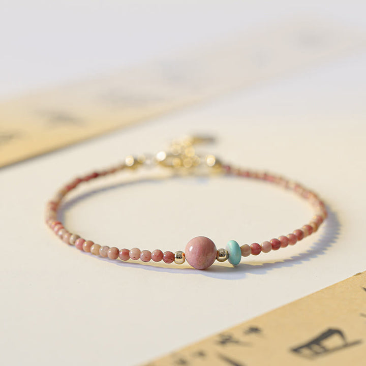 Pulsera de cadena de energía amorosa de rodonita natural chapada en oro de 14 quilates con Buddha Stones