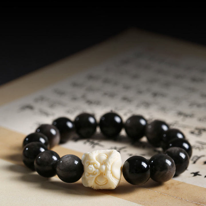Pulsera de protección con Buddha Stones, obsidiana con brillo plateado, semilla de Bodhi, marfil, fruta, león danzante