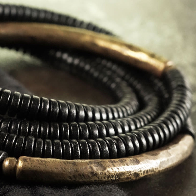 Pulsera multicapa con Buddha Stones, madera de ébano, latón y cobre - image 9