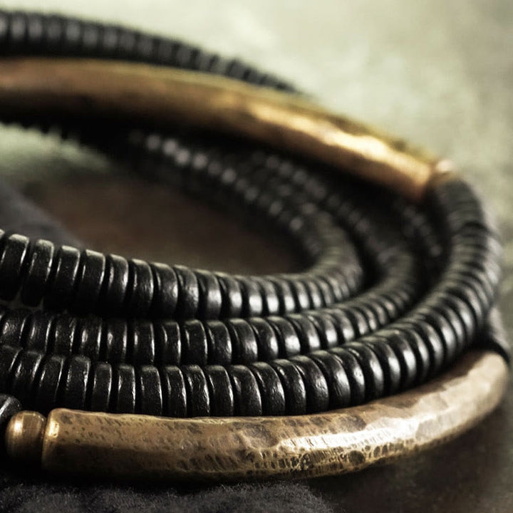 Pulsera multicapa con Buddha Stones, madera de ébano, latón y cobre - image 9