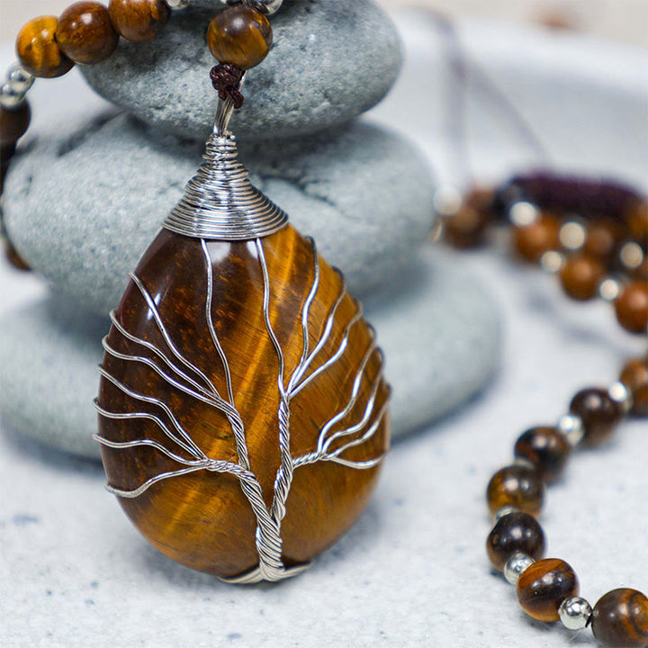 Collar con colgante de cuentas de fuerza de ojo de tigre natural de Buddha Stones