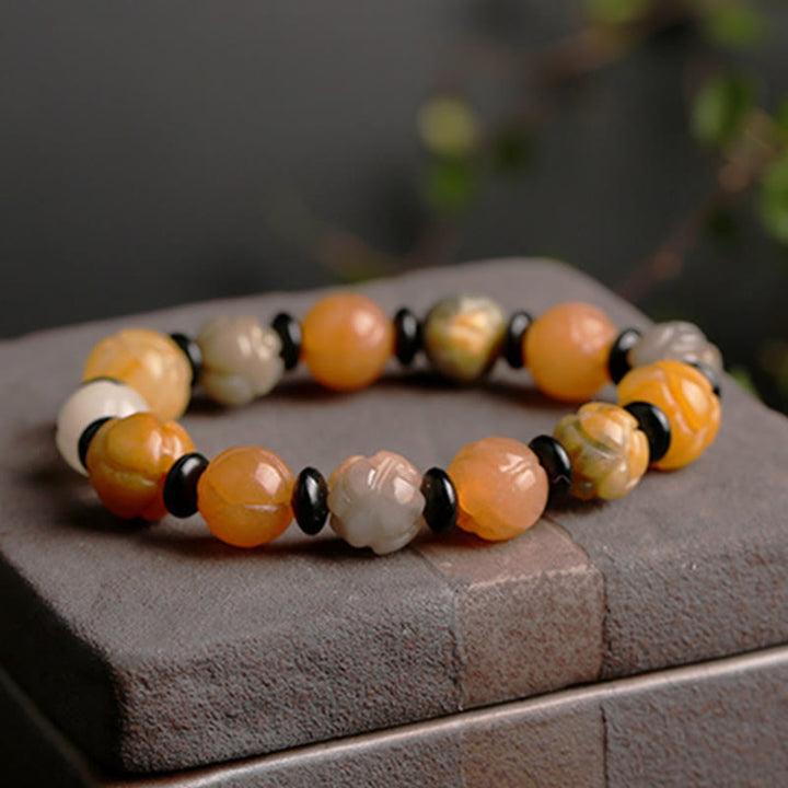 Pulsera de suerte y riqueza de loto de jade de seda dorada
