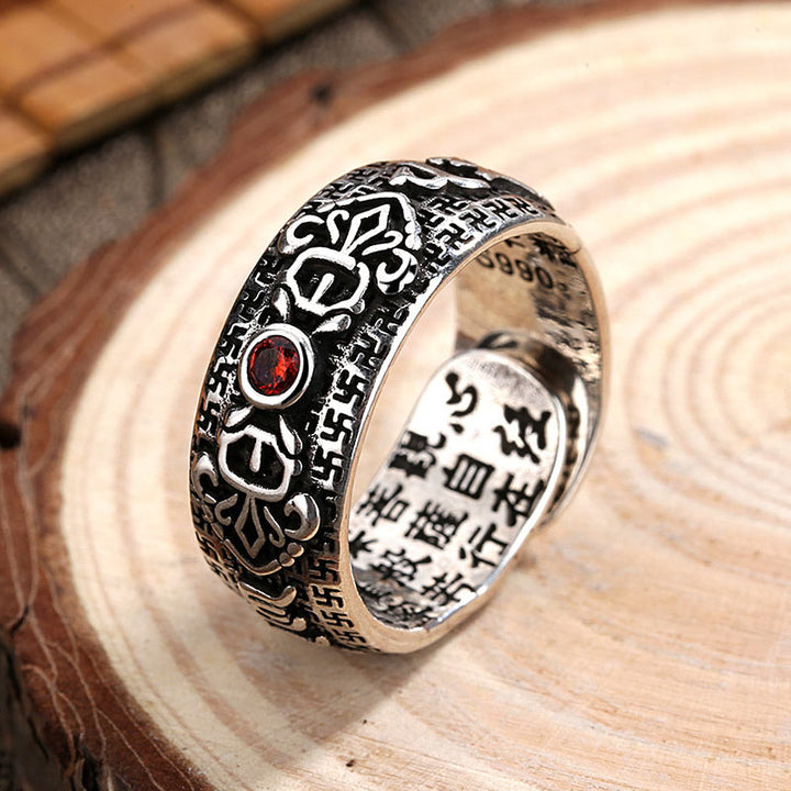 Anillo de riqueza de cobre y rubí tibetano