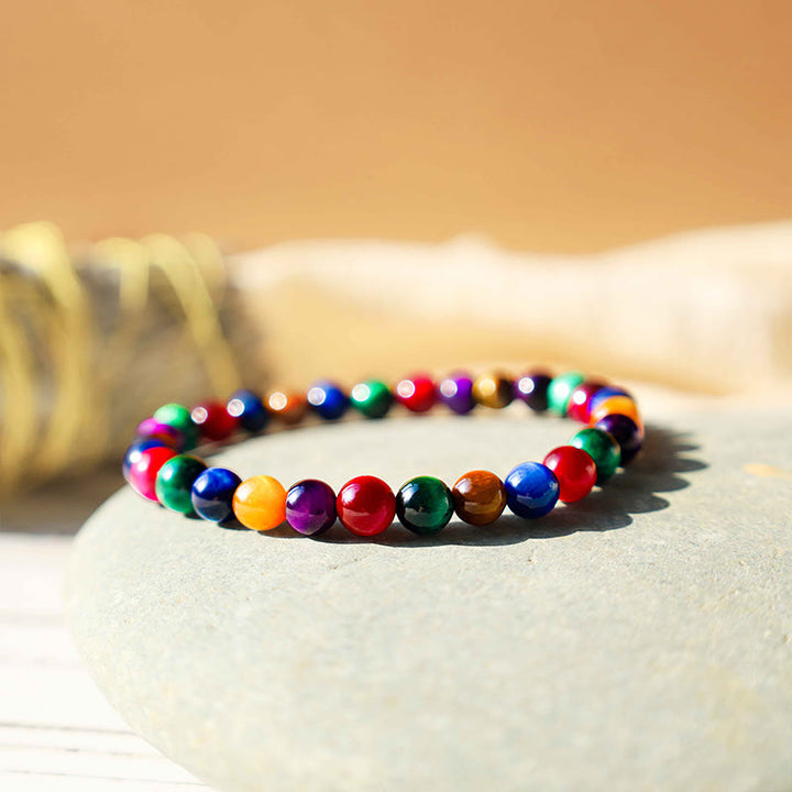 Pulsera Resolve Courage con Ojo de Tigre y Buddha Stones