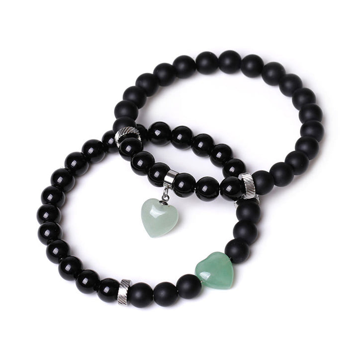 Buddha Stones 2 piezas de piedra de cristal de ónix negro amor protección del corazón pulsera de pareja