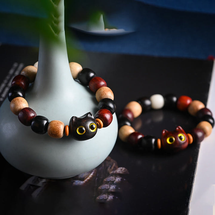 Pulsera de protección con grabado de gato lindo de madera de ébano de sándalo rojo de hoja pequeña con Buddha Stones - image 20