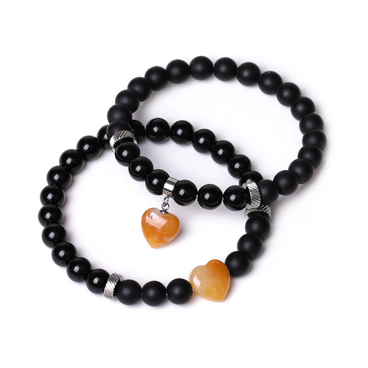 Buddha Stones 2 piezas de piedra de cristal de ónix negro amor protección del corazón pulsera de pareja