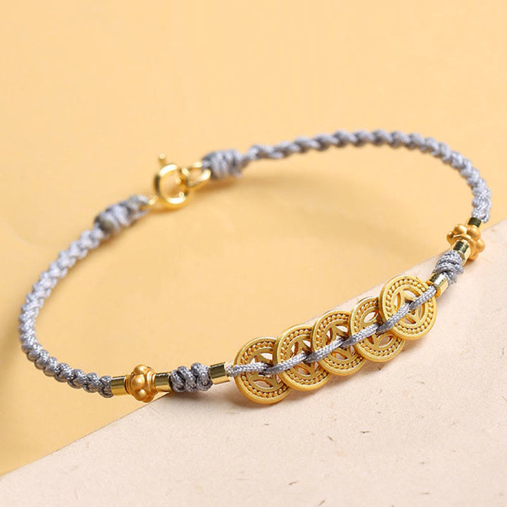 Pulsera trenzada de cuerda azul con Buddha Stones, moneda de cobre, árbol de la fortuna, perla, suerte