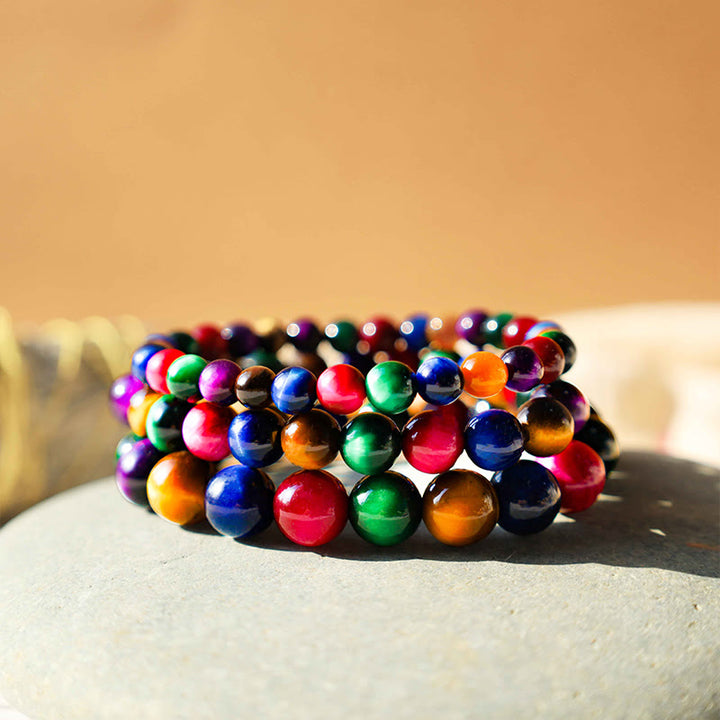 Pulsera Resolve Courage con Ojo de Tigre y Buddha Stones