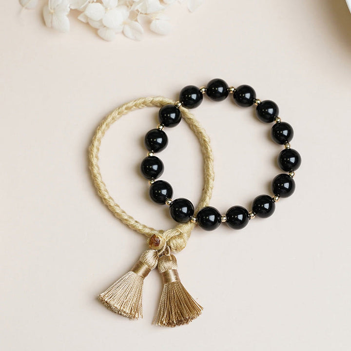 Buddha Stones 2 pulseras de cuerda de protección con soporte de cuentas de ónix negro