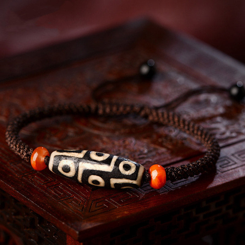 Pulsera de hilo de prosperidad con cuentas Dzi tibetanas de nueve ojos con Buddha Stones