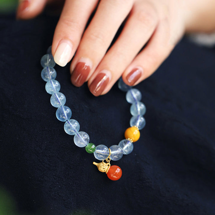 Pulsera con dije de calabaza de la paz con ágata roja y aguamarina
