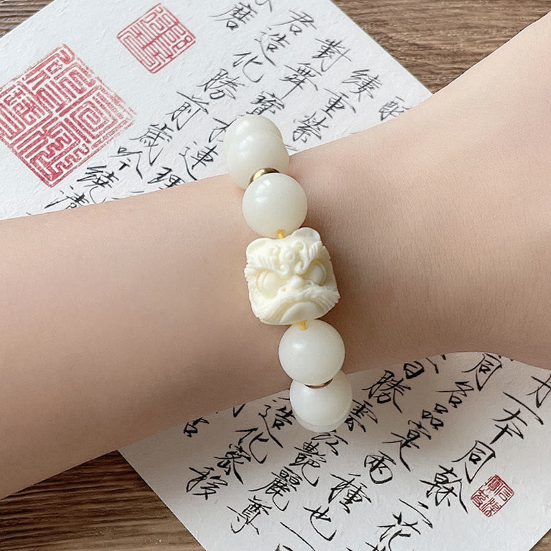Pulsera de protección con Buddha Stones, obsidiana con brillo plateado, semilla de Bodhi, marfil, fruta, león danzante
