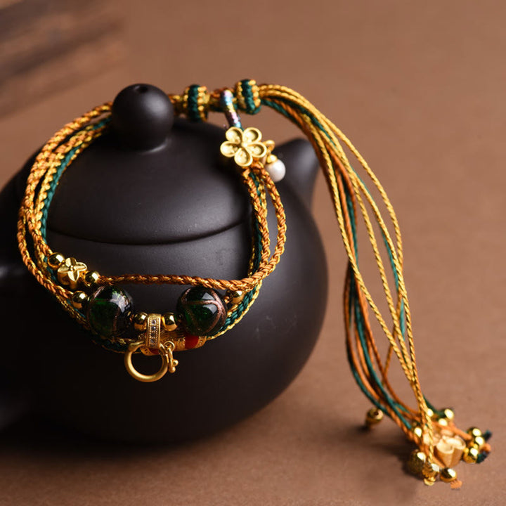 Pulsera curativa multicapa trenzada con cuentas de vidrio Liuli de cuerda hecha a mano tibetana con Buddha Stones