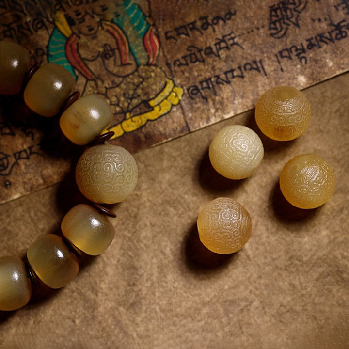 Pulsera auspiciosa hecha a mano con Buddha Stones, cuerno de oveja tibetano Om Mani Padme Hum