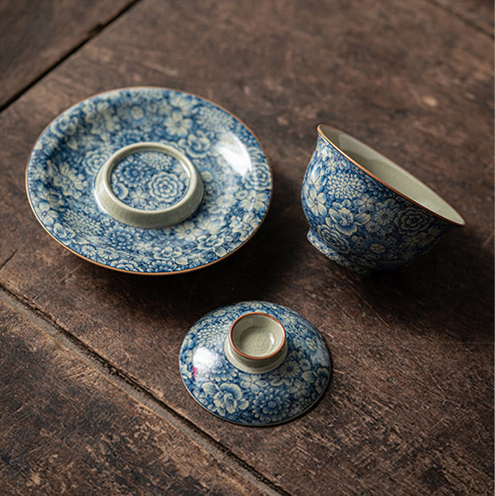 Buddha Stones azul y blanca vintage Flor de durazno Loto Peonía Cerámica Gaiwan Sancai Taza de té Kung Fu Taza de té y platillo con tapa