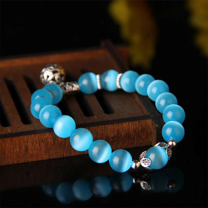 Pulsera de la suerte con ojo de gato tibetano y Buddha Stones