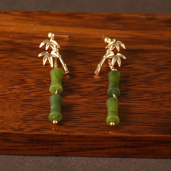 Pendientes colgantes de hoja de bambú, peridoto natural, oro chapado en cobre, postes de plata de ley 925 con Buddha Stones