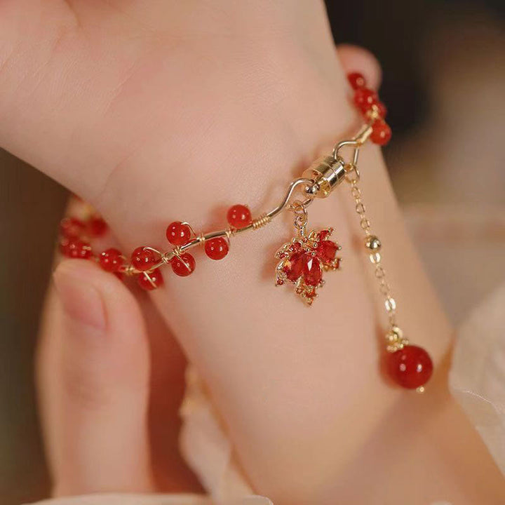 Pulsera con amuleto de la suerte de hoja de arce roja con Buddha Stones