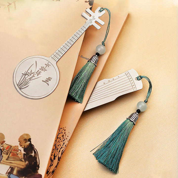 Buddha Stones instrumentos musicales clásicos Pipa Guzheng Guqin Ruan marcapáginas de Metal borla con caja de regalo