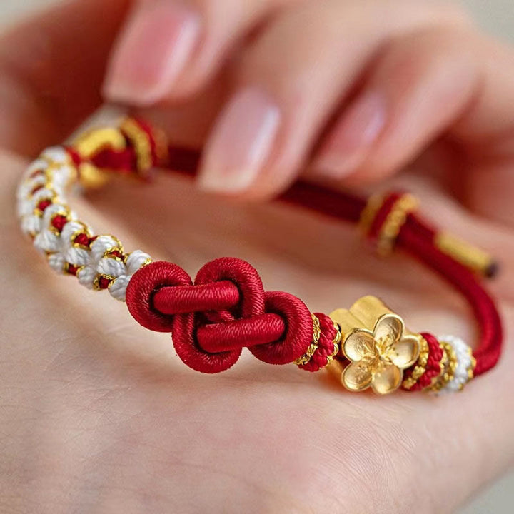 Pulsera de cuerda de la suerte con dije de flor de melocotón, nudo de amor verdadero hecho a mano con Buddha Stones