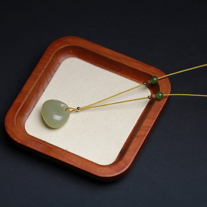Colgante de collar de cadena de prosperidad con patrón de bolsa pequeña de jade hetiano natural